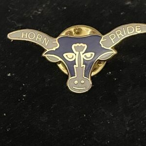 1.25” gold tone and purple enamel Horn Pride lapel hat tie pin